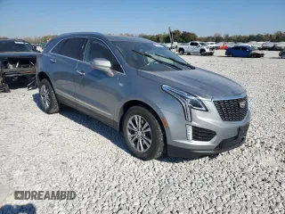 2023 Cadillac XT5 FWD Premium Luxury with VIN 1GYKNCRS6PZ100071, listed as a Copart auction lot 76248224 with 25,613 mi miles and Salvage Title. Bid and sale history available at carsss.com. Image 4.