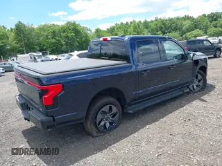 2023 Ford F-150 Lightning Pro с VIN 1FT6W1EVXPWG42428, выставлен на аукционе IAAI как лот 39711091 с пробегом 6 308 миль миль и . История ставок и продаж доступна на DreamBid. Изображение 4.