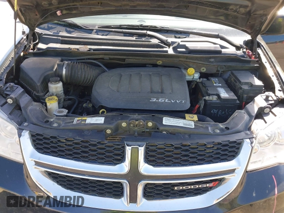 2014 Dodge Grand Caravan SXT with VIN 2C4RDGCG4ER341699, listed as a IAAI auction lot 42064523 with 234,422 mi miles and . Bid and sale history available at DreamBid. Image 10.