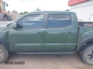 2021 Toyota Tacoma SR z VIN 3TYCZ5AN2MT049069, wystawiony jako IAAI lot #42116964 z przebiegiem 96 275 mil mil oraz . Historia ofert i sprzedaży dostępna na DreamBid. Obrazek 14.