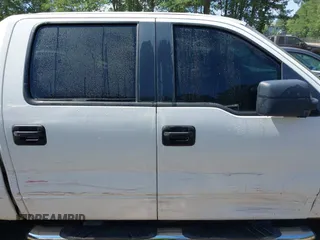 2007 Ford F-150 XLT with VIN 1FTRW12W67KD08558, listed as a IAAI auction lot 42542860 with 168,948 mi miles and . Bid and sale history available at DreamBid. Image 13.