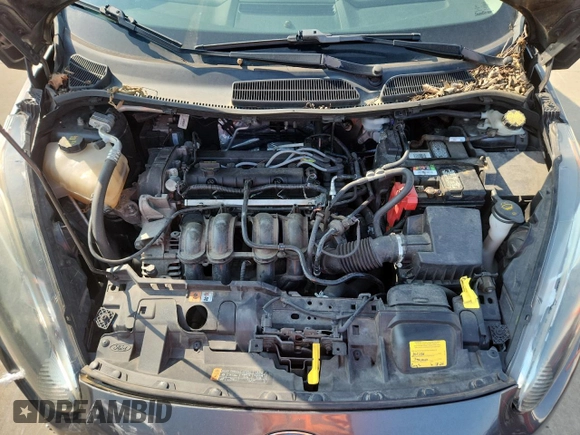 2015 Ford Fiesta SE z VIN 3FADP4BJ2FM161312, wystawiony jako Copart lot #59104495 z przebiegiem 110 583 mil mil oraz Szkoda całkowita • Salvage title. Historia ofert i sprzedaży dostępna na DreamBid. Obrazek 11.