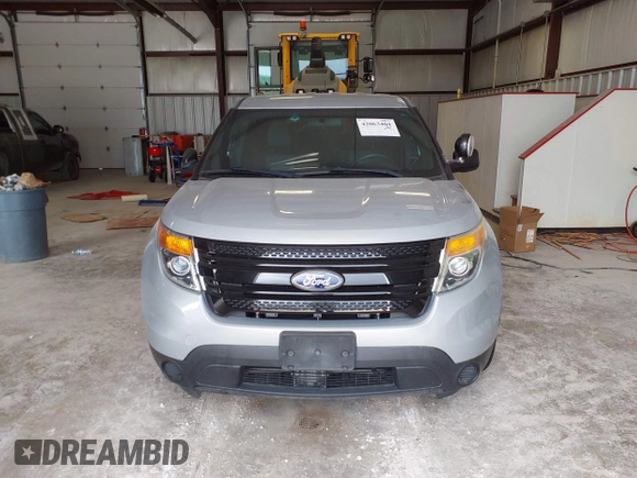 2013 Ford Police Interceptor Utility z VIN 1FM5K8AR8DGA68521, wystawiony jako IAAI lot #42063404 z przebiegiem 84 716 mil mil oraz . Historia ofert i sprzedaży dostępna na DreamBid. Obrazek 12.