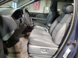 2002 Toyota Sienna LE with VIN 4T3ZF13C42U437712, listed as a Copart auction lot 64836245 with 151,693 mi miles and Salvage title. Bid and sale history available at DreamBid. Image 7.