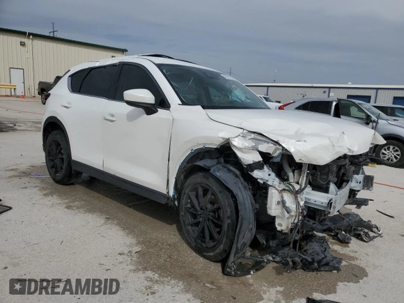 2017 Mazda CX-5 Grand Touring with VIN JM3KFBDL8H0209075, listed as a Copart auction lot 47991735 with 209,743 mi miles and Salvage Title. Bid and sale history available at carsss.com. Image 4.