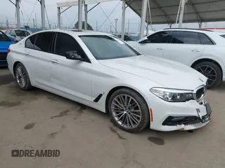 2018 BMW 5 Series 530e with VIN WBAJA9C5XJB033667, listed as a IAAI auction lot 42107936 with 55,753 mi miles and . Bid and sale history available at DreamBid. Image 1.