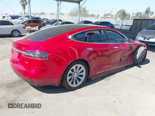 2016 Tesla Model S 90D with VIN 5YJSA1E22GF174654, listed as a IAAI auction lot 41700676 with 193,813 mi miles and . Bid and sale history available at DreamBid. Image 4.