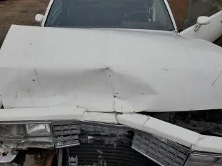 1984 Chevrolet El Camino z VIN 1GCCW80HXER207627, wystawiony jako Copart lot #77284194 z przebiegiem 90 554 mil mil oraz Szkoda całkowita • Salvage title. Historia ofert i sprzedaży dostępna na DreamBid. Obrazek 11.