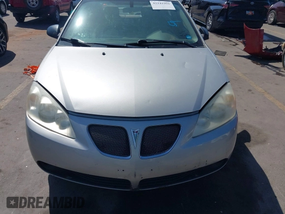 2005 Pontiac G6 GT z VIN 1G2ZH528754171686, wystawiony jako IAAI lot #42241991 z przebiegiem 168 361 mil mil oraz . Historia ofert i sprzedaży dostępna na DreamBid. Obrazek 12.