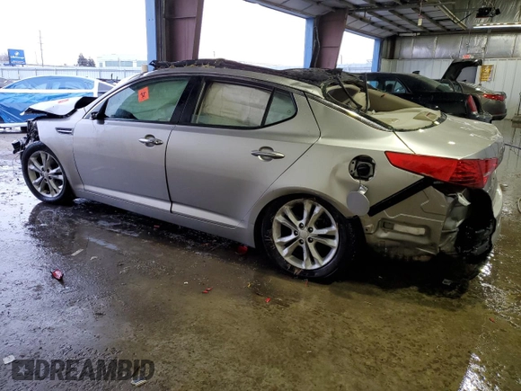 2013 Kia Optima EX с VIN 5XXGN4A70DG239393, выставлен на аукционе Copart как лот 41923615 с пробегом Не указан миль и Списание • Salvage title. История ставок и продаж доступна на DreamBid. Изображение 2.