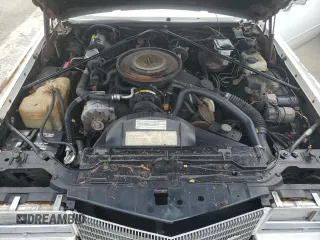 1984 Cadillac Eldorado z VIN 1G6AL5783EE654296, wystawiony jako Copart lot #74945374 z przebiegiem 37 040 mil mil oraz Szkody całkowita. Historia ofert i sprzedaży dostępna na DreamBid. Obrazek 11.