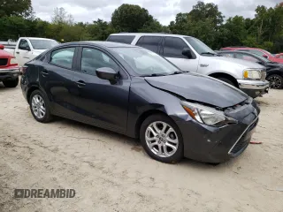 2016 Scion iA z VIN 3MYDLBZV6GY101015, wystawiony jako Copart lot #68777453 z przebiegiem 112 517 mil mil oraz . Historia ofert i sprzedaży dostępna na DreamBid. Obrazek 4.