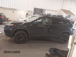 2016 Jeep Cherokee Latitude with VIN 1C4PJMCB2GW197454, listed as a IAAI auction lot 42289019 with 101,895 mi miles and . Bid and sale history available at DreamBid. Image 14.