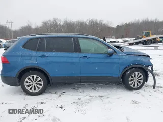 2018 Volkswagen Tiguan S z VIN 3VV0B7AX8JM081263, wystawiony jako IAAI lot #41245308 z przebiegiem 58 778 mil mil oraz . Historia ofert i sprzedaży dostępna na DreamBid. Obrazek 13.