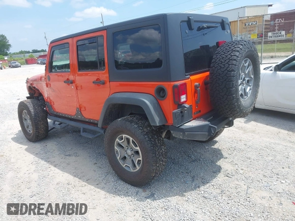 2015 Jeep Wrangler Unlimited Rubicon z VIN 1C4BJWFG4FL598033, wystawiony jako IAAI lot #42435523 z przebiegiem 134 202 mil mil oraz . Historia ofert i sprzedaży dostępna na DreamBid. Obrazek 3.