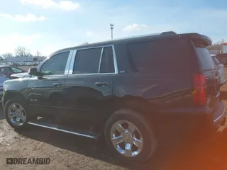 2015 Chevrolet Tahoe LTZ with VIN 1GNSKCKC5FR115779, listed as a IAAI auction lot 41538240 with 155,271 mi miles. Bid and sale history available at carsss.com. Image 15.