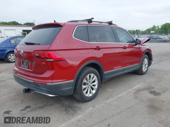 2018 Volkswagen Tiguan SEL with VIN 3VV3B7AXXJM086672, listed as a IAAI auction lot 42006533 with 90,511 mi miles and . Bid and sale history available at DreamBid. Image 4.
