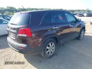 2013 Kia Sorento LX with VIN 5XYKT3A14DG394689, listed as a IAAI auction lot 42646381 with 76,523 mi miles and . Bid and sale history available at DreamBid. Image 4.