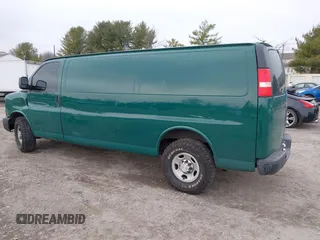 2014 Chevrolet Express Cargo Van with VIN 1GCWGGCAXE1198199, listed as a IAAI auction lot 41242821 with 274,446 mi miles. Bid and sale history available at carsss.com. Image 3.