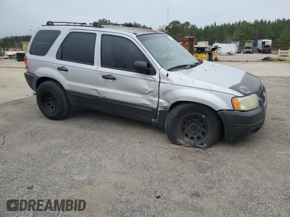 2003 Ford Escape XLS Popular with VIN 1FMYU02173KB43156, listed as a Copart auction lot 51534495 with 266,600 mi miles and Salvage title. Bid and sale history available at DreamBid. Image 4.