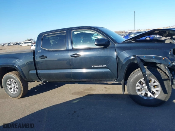 2019 Toyota Tacoma 4WD SR5 with VIN 3TMDZ5BN1KM060088, listed as a IAAI auction lot 41804525 with 69,893 mi miles. Bid and sale history available at carsss.com. Image 13.