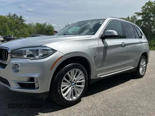 2016 BMW X5 xDrive40e z VIN 5UXKT0C52G0F74828, wystawiony jako Copart lot #58977975 z przebiegiem 122 045 mil mil oraz Tytuł czysty. Historia ofert i sprzedaży dostępna na DreamBid. Obrazek 2.