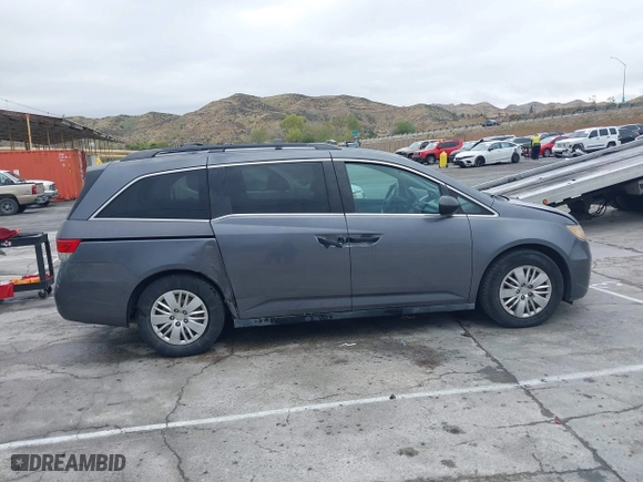 2014 Honda Odyssey LX with VIN 5FNRL5H28EB101376, listed as a IAAI auction lot 41772529 with 122,504 mi miles. Bid and sale history available at carsss.com. Image 13.