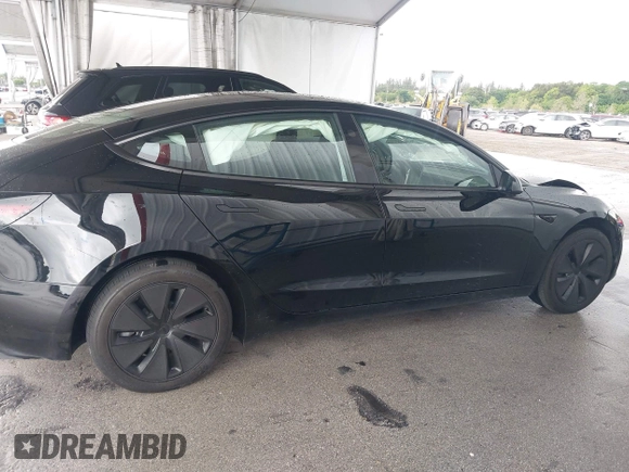 2024 Tesla Model 3 with VIN 5YJ3E1EA6RF731312, listed as a IAAI auction lot 41987407 with 5,025 mi miles and . Bid and sale history available at DreamBid. Image 13.