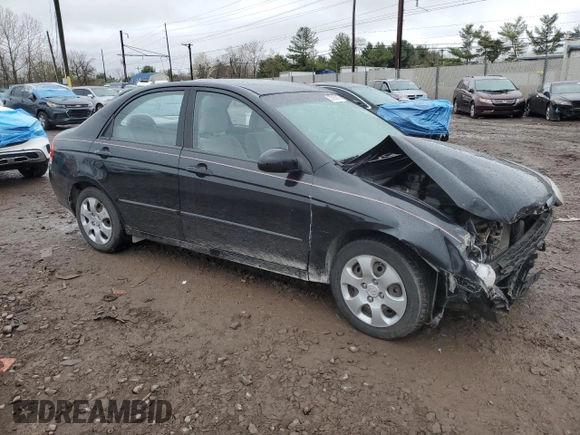 2009 Kia Spectra EX with VIN KNAFE222495648220, listed as a Copart auction lot 52886915 with 146,417 mi miles and Salvage title. Bid and sale history available at DreamBid. Image 4.