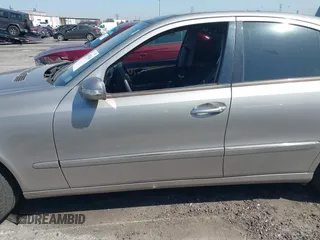 2006 Mercedes-Benz E-Class 3.5L with VIN WDBUF56J96A838185, listed as a IAAI auction lot 41981543 with 213,431 mi miles. Bid and sale history available at carsss.com. Image 6.