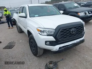 2023 Toyota Tacoma SR with VIN 3TYAX5GN0PT068597, listed as a IAAI auction lot 41603109 with 33,279 mi miles and . Bid and sale history available at DreamBid. Image 1.