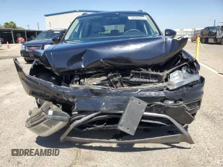 2018 Volkswagen Tiguan S with VIN 3VV1B7AXXJM069099, listed as a Copart auction lot 52345235 with 79,359 mi miles and Salvage title. Bid and sale history available at DreamBid. Image 5.