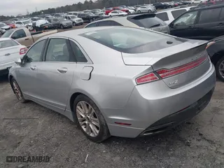 2014 Lincoln MKZ with VIN 3LN6L2JK9ER804197, listed as a IAAI auction lot 41610850 with 159,389 mi miles. Bid and sale history available at carsss.com. Image 3.