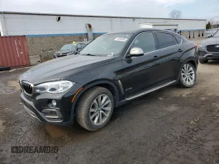 2019 BMW X6 xDrive35i with VIN 5UXKU2C5XK0Z65840, listed as a Copart auction lot 46306385 with 66,933 mi miles and Salvage Title. Bid and sale history available at carsss.com. Image 1.