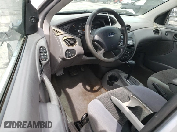 2004 Ford Focus SE with VIN 1FAFP34344W113759, listed as a Copart auction lot 51386335 with 148,267 mi miles and Salvage title. Bid and sale history available at DreamBid. Image 8.