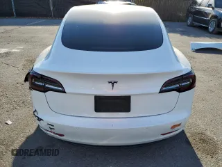 2020 Tesla Model 3 Standard Range Plus with VIN 5YJ3E1EA0LF808571, listed as a Copart auction lot 47827615 with 125,444 mi miles and Salvage Title. Bid and sale history available at DreamBid. Image 6.