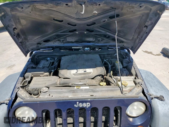 2013 Jeep Wrangler Unlimited Sport with VIN 1C4HJWDG2DL620654, listed as a Copart auction lot 52704645 with 133,932 mi miles and Clean title. Bid and sale history available at DreamBid. Image 12.