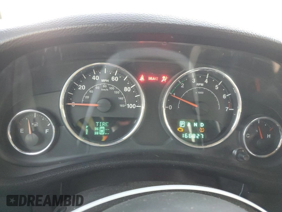 2013 Jeep Wrangler Unlimited Freedom z VIN 1C4BJWDG0DL513902, wystawiony jako Copart lot #52045975 z przebiegiem 166 827 mil mil oraz Szkoda całkowita • Salvage title. Historia ofert i sprzedaży dostępna na DreamBid. Obrazek 9.