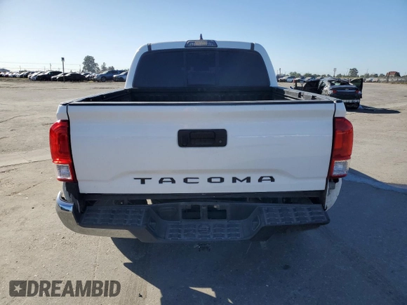 2017 Toyota Tacoma SR z VIN 5TFAX5GNXHX074690, wystawiony jako Copart lot #56672165 z przebiegiem 107 292 mil mil oraz Szkoda całkowita • Salvage title. Historia ofert i sprzedaży dostępna na DreamBid. Obrazek 6.