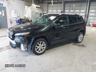 2015 Jeep Cherokee Latitude with VIN 1C4PJMCB5FW768854, listed as a IAAI auction lot 41246213 with 131,112 mi miles. Bid and sale history available at carsss.com. Image 2.