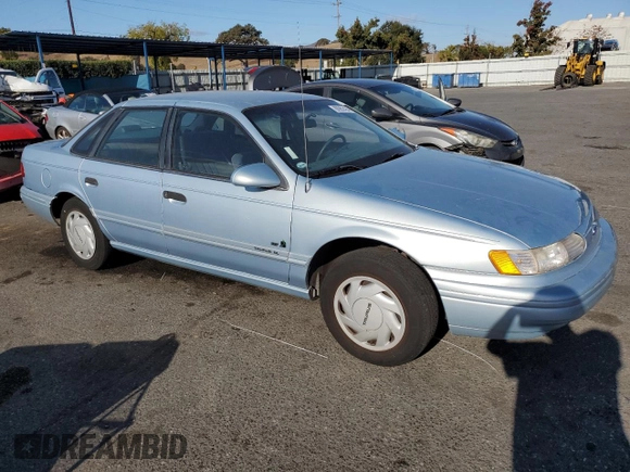 1993 Ford Taurus with VIN 1FACP5216PG197713, listed as a Copart auction lot 80982424 with 79,330 mi miles and Salvage title. Bid and sale history available at DreamBid. Image 4.