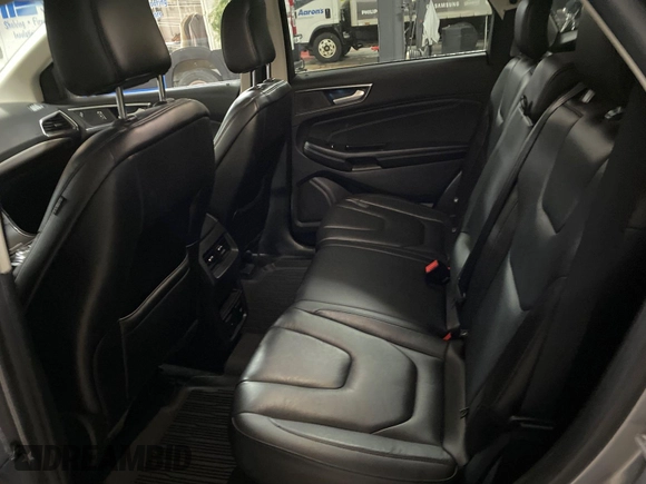 2020 Ford Edge Titanium z VIN 2FMPK4K91LBA91290, wystawiony jako IAAI lot #42494043 z przebiegiem 71 254 mil mil oraz . Historia ofert i sprzedaży dostępna na DreamBid. Obrazek 5.