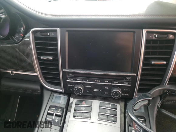 2014 Porsche Panamera GTS z VIN WP0AF2A74EL083559, wystawiony jako Copart lot #66331304 z przebiegiem Nie podano mil oraz Nie do naprawy • Non repairable. Historia ofert i sprzedaży dostępna na DreamBid. Obrazek 9.