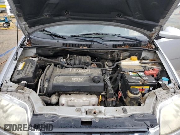 2006 Chevrolet Aveo LS with VIN KL1TD566X6B554368, listed as a Copart auction lot 61682645 with 97,701 mi miles and Salvage title. Bid and sale history available at DreamBid. Image 11.