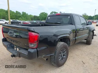 2020 Toyota Tacoma SR with VIN 3TYRX5GN1LT002234, listed as a IAAI auction lot 42082830 with 128,589 mi miles and . Bid and sale history available at DreamBid. Image 4.
