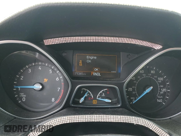2016 Ford Focus SE z VIN 1FADP3F2XGL341167, wystawiony jako Copart lot #59042435 z przebiegiem 71 345 mil mil oraz Szkoda całkowita • Salvage title. Historia ofert i sprzedaży dostępna na DreamBid. Obrazek 9.