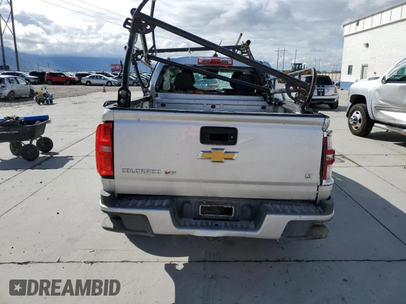 2020 Chevrolet Colorado 4WD LT with VIN 1GCGTCEN1L1113627, listed as a Copart auction lot 54939715 with 71,227 mi miles and Salvage title. Bid and sale history available at DreamBid. Image 6.