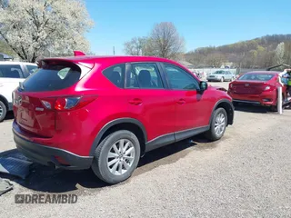 2015 Mazda CX-5 Sport с VIN JM3KE2BE1F0489572, выставлен на аукционе IAAI как лот 42051148 с пробегом 134 405 миль миль и . История ставок и продаж доступна на DreamBid. Изображение 4.