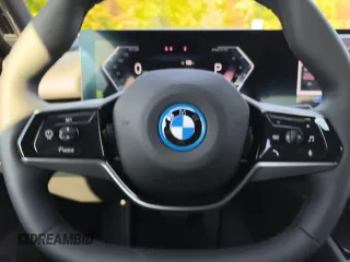 2024 BMW i5 eDrive40 with VIN WBY33FK05RCR58520, listed as a Copart auction lot 77179704 with 16 mi miles and Salvage Title. Bid and sale history available at carsss.com. Image 10.