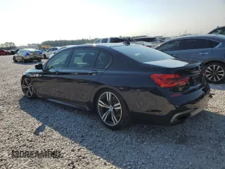 2019 BMW 7 Series 740i with VIN WBA7E2C50KB216499, listed as a Copart auction lot 68828673 with 94,549 mi miles. Bid and sale history available at carsss.com. Image 2.